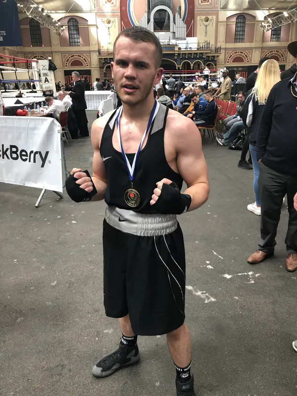 Bradley O'Connor wearing a medal at an amateur championship