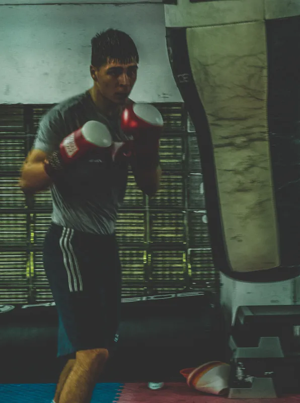 Constantin Ursu throwing a shot on the heavy bag at Intense